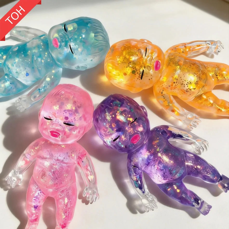 Poupée bébé squishy pailletée anti-stress - plusieurs couleurs